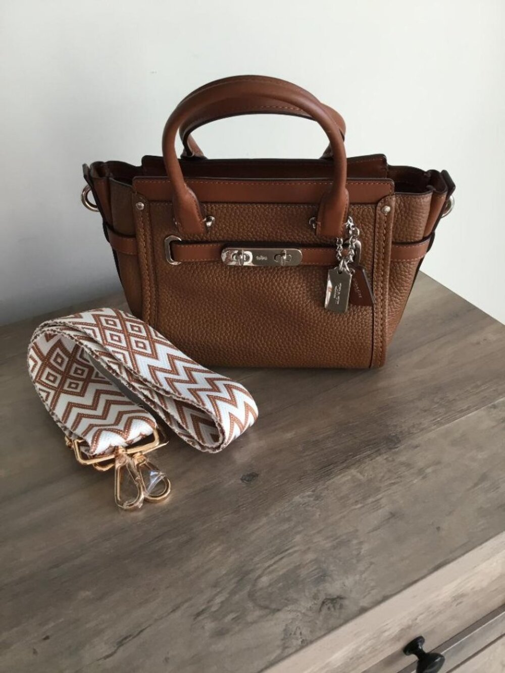 Coach Swagger 21 Pebble Leather in Saddle Brown w/Double Turnlock Metal Bar